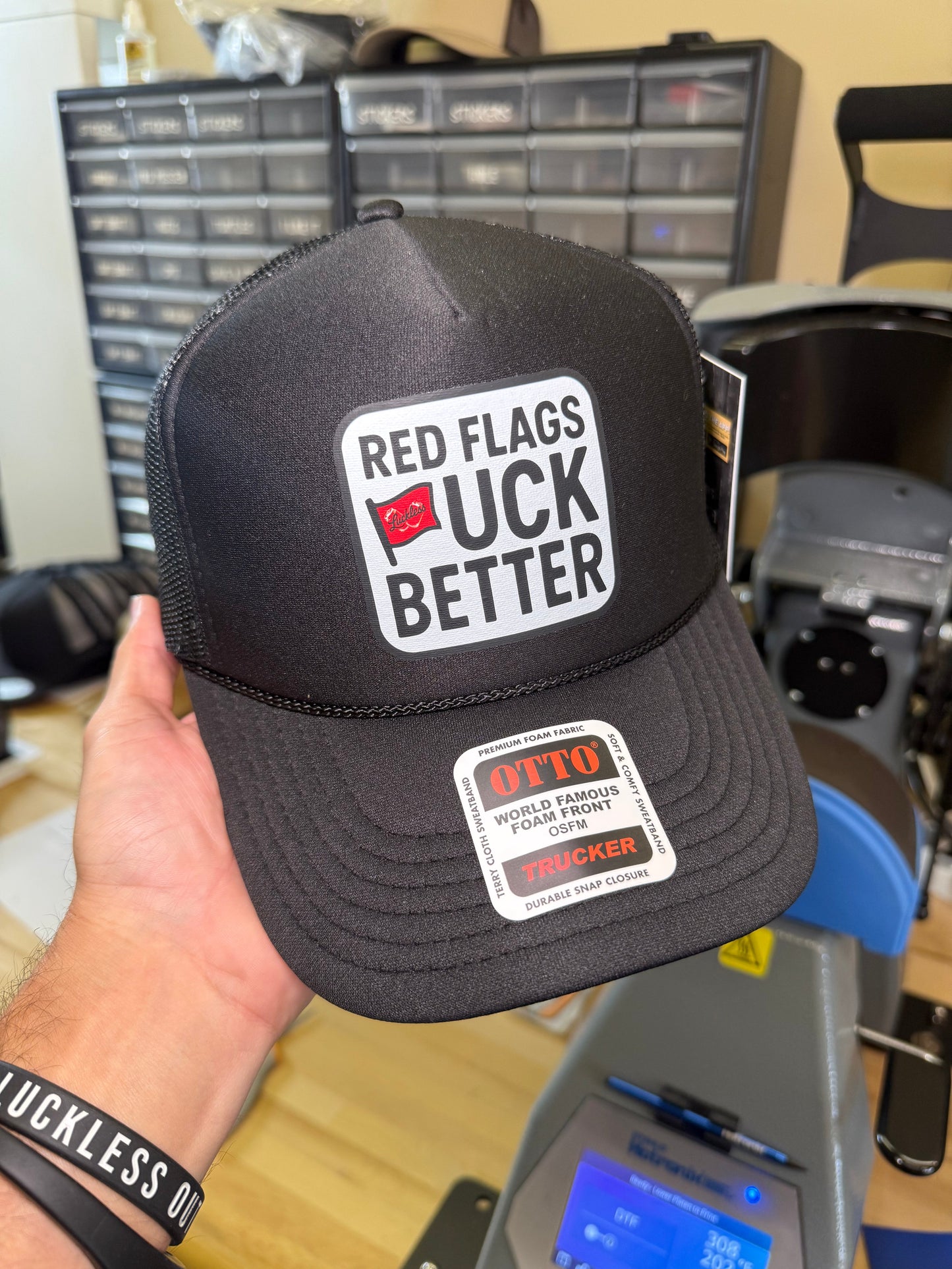 Red Flags Fuck Better Trucker Hat by Luckless Outfitters