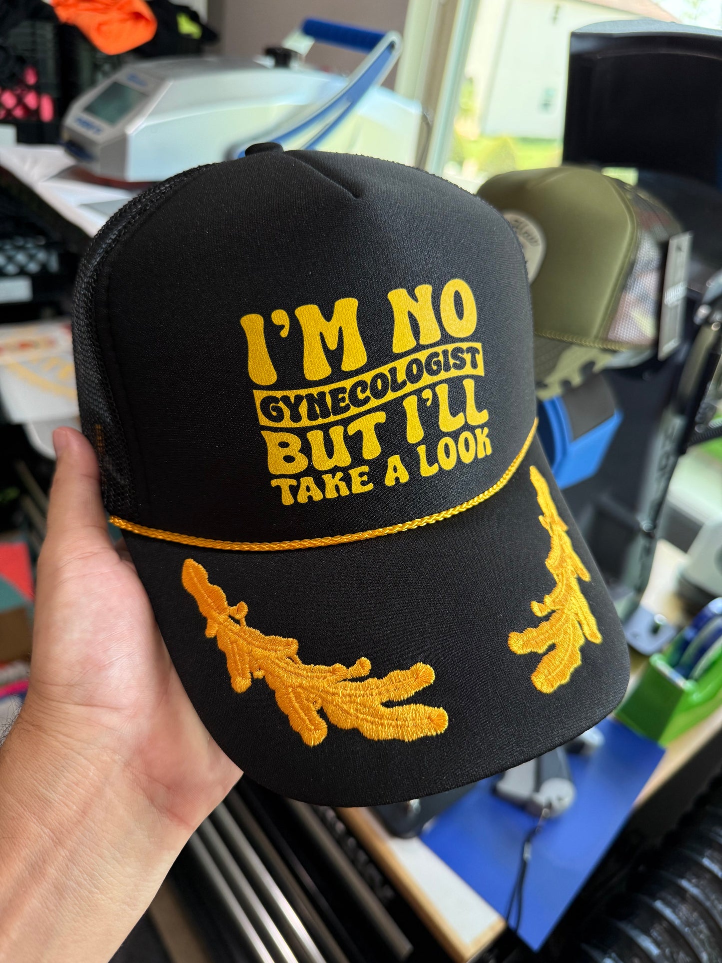 I'll Take A Look Trucker Hat by Luckless Outfitters