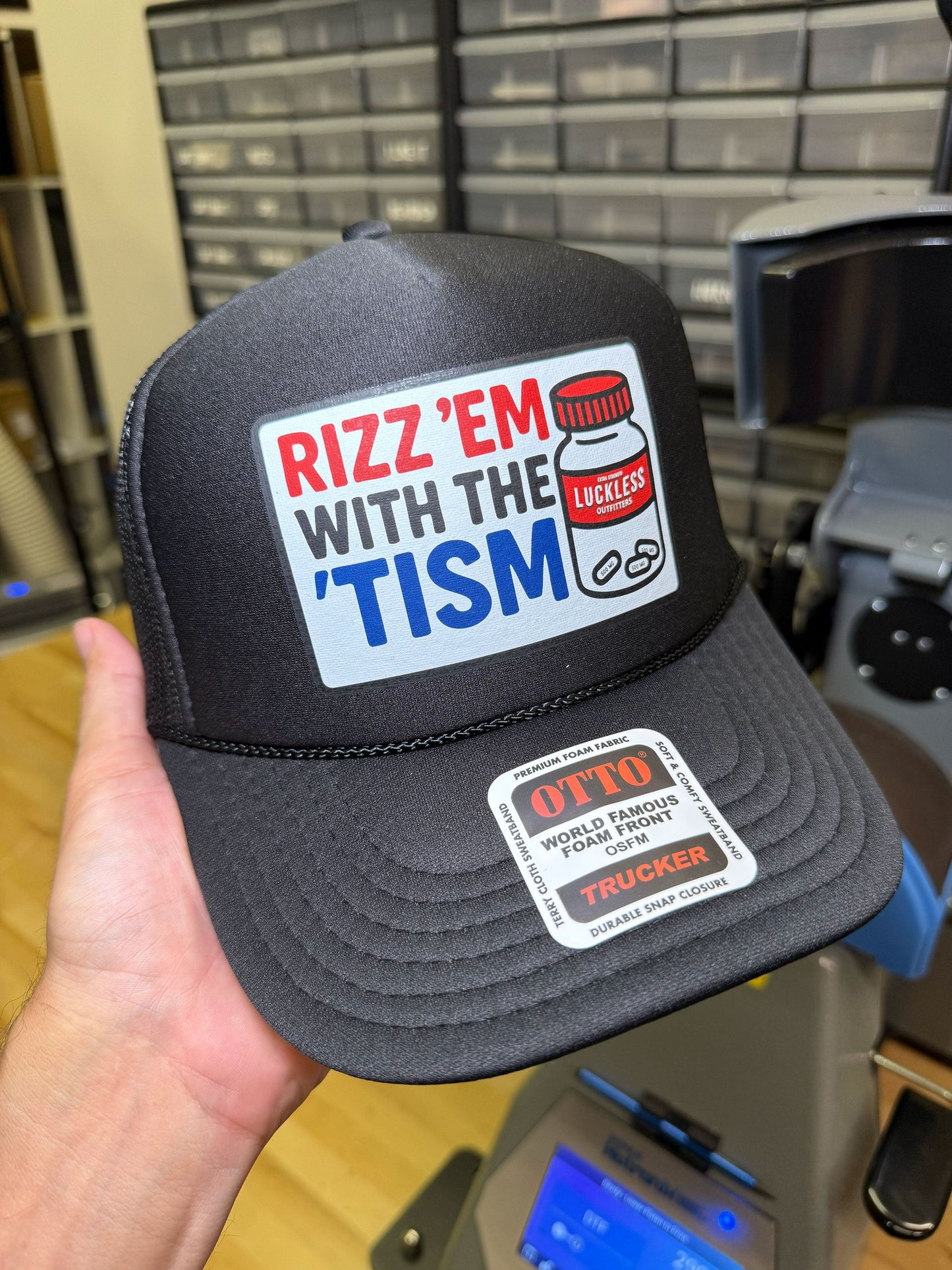 Rizz 'Em With The 'Tism Adjustable Trucker Hat