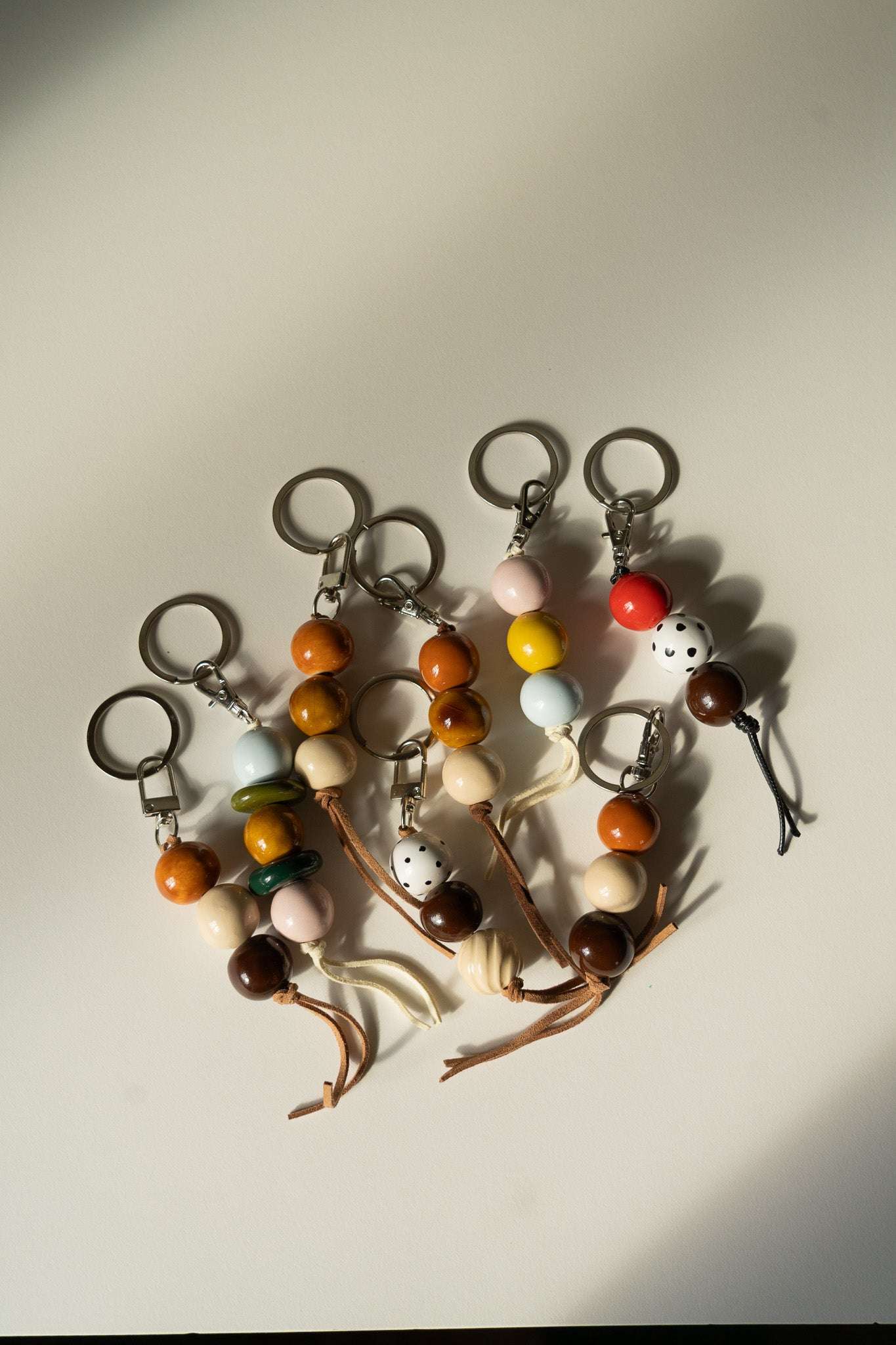 Handmade Ceramic Beaded Keychain in Brown and Red Tones
