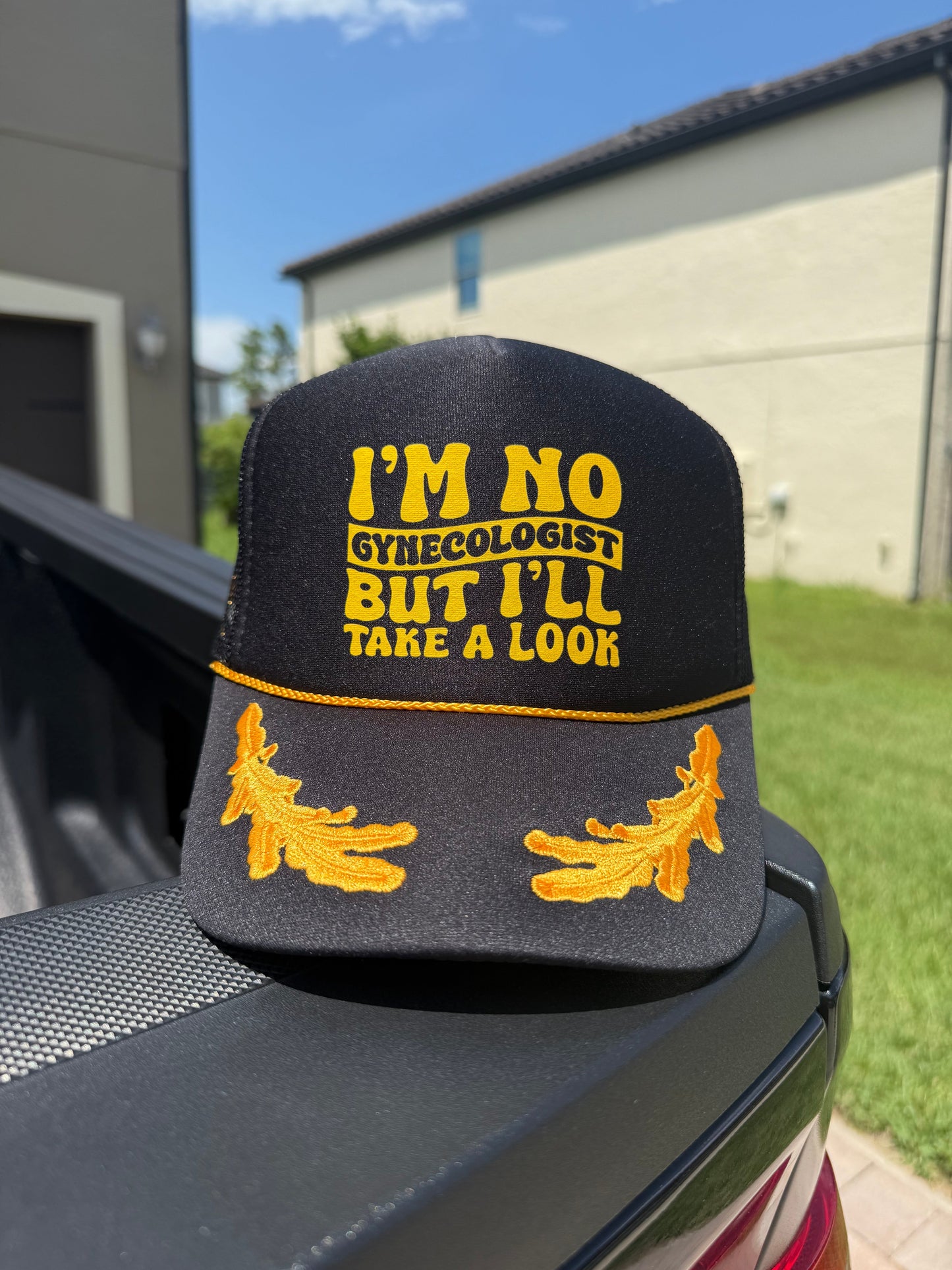 I'll Take A Look Trucker Hat by Luckless Outfitters