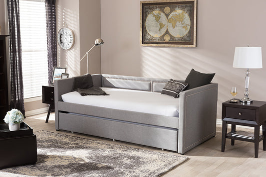 Baxton Studio Raymond Modern and Contemporary Grey Fabric Nail Heads Trimmed Sofa Twin Daybed with Roll-Out Trundle Guest Bed