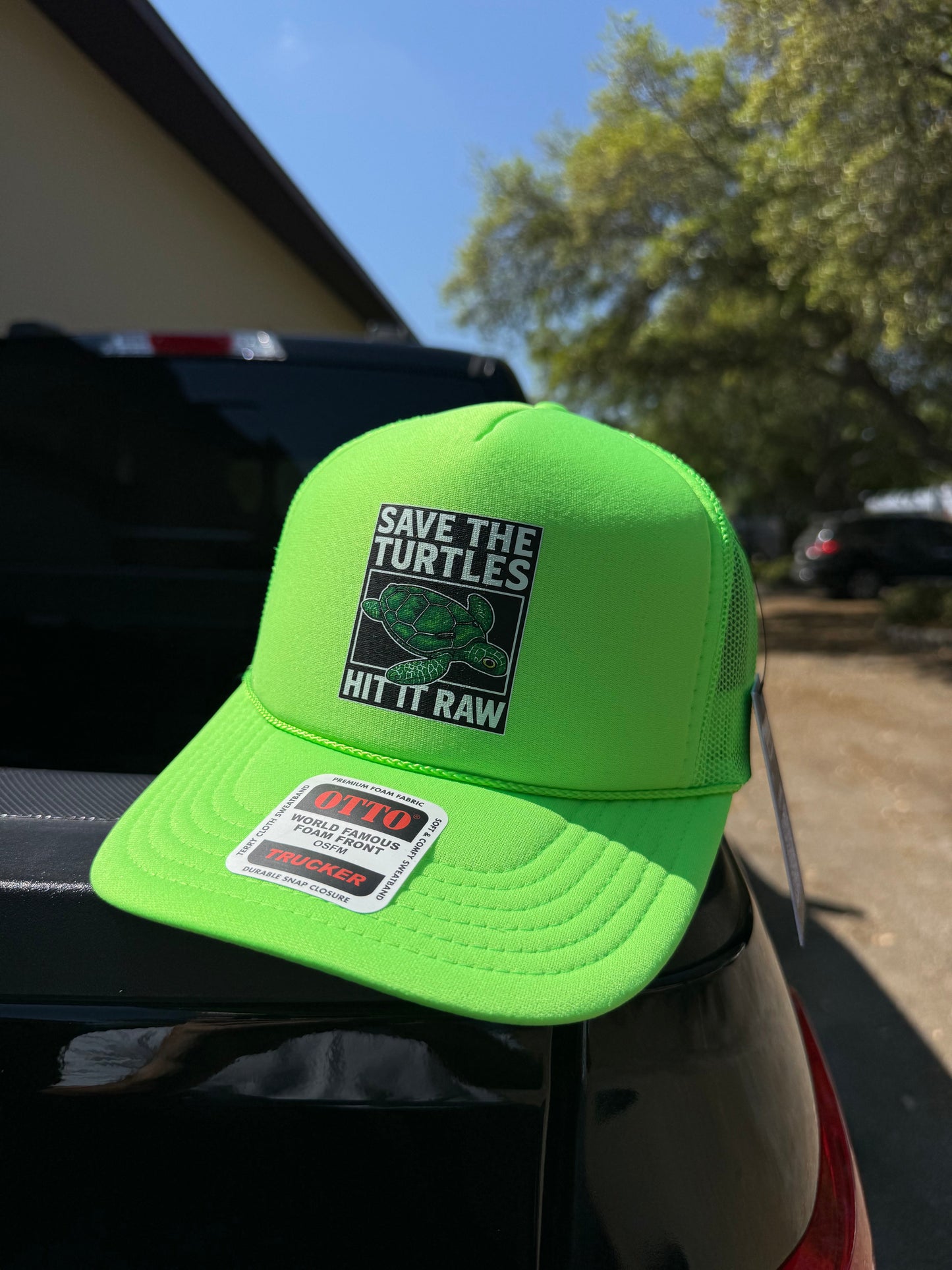 Save The Turtles Neon Green Foam Front Trucker Hat by Luckless Outfitters